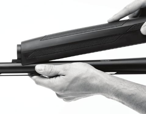 Angle the forearm onto the front of the barrel bracket and push the forearm forward. FIGURE 8 When the forearm is completely forward, snap the rear of it into position on the barrel.