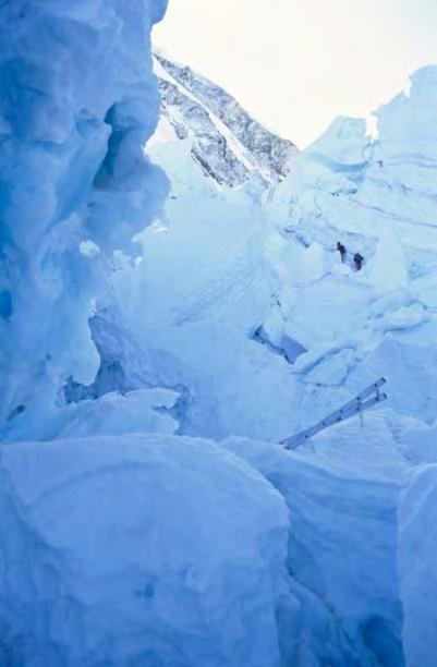 Khumbu ice towers and climbers Camp I, top of Khumbu Icefall My Personal Decisive Moment At Base Camp I was engaged in a personal dilemma.