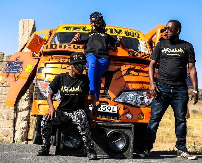 Matatu Culture fans during a photo-shoot with a Route 12c matatu known as Ngamia 2.