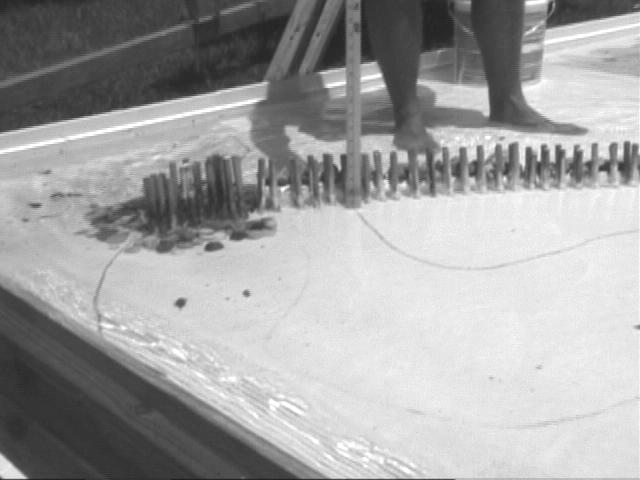 Figure 9 First Peak physical model of north jetty deck extension with double pilings.