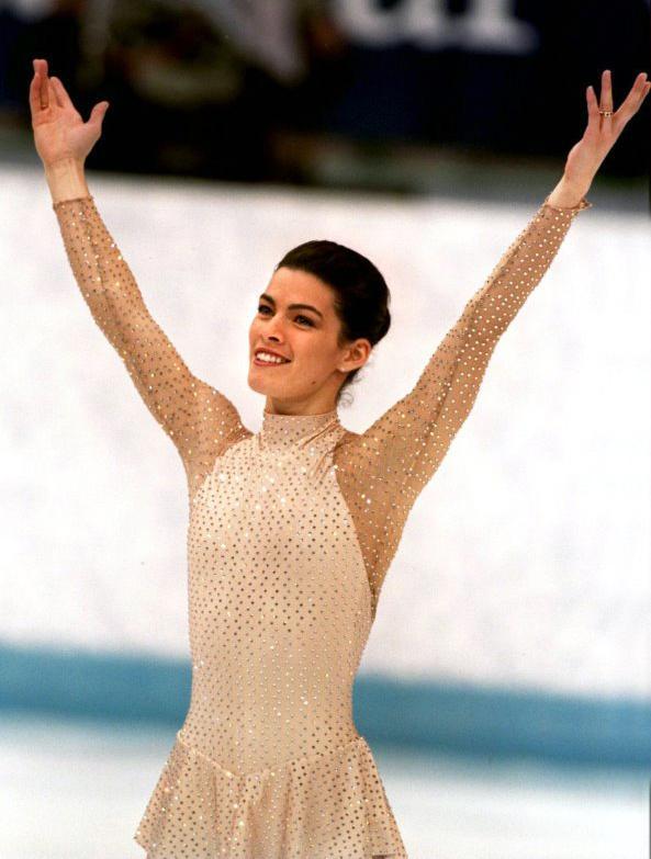 Nancy Kerrigan Biography -She is an American figure skater from Stoneham, Massachusetts -Born on October 13, 1969 -She has two older brothers -Her father worked multiple jobs in order to pay for her