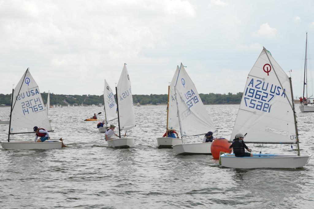 2. To encourage their continued participation in Optimist racing. (Skippers must be 15 years old or under on the day of the regatta.