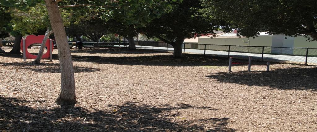 The dog park includes: Two enclosed areas (one for large and one for small dogs) Water source, clean-up