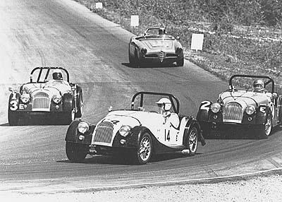Jack and GB in 1959 Jack Murray, #10, leads dad around the hairpin at Westwood. The car on the inside must be an MGA Twin Cam, because the standard model raced two or three classes lower than D.