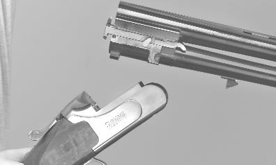 Lift up and out to separate the barrels from the receiver.