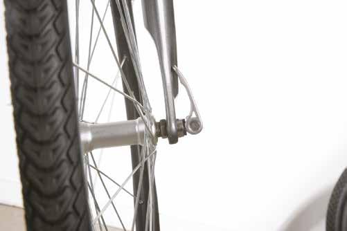 To refit, insert the axle into the forks or the rear of the frame. Then use your thumbs to centre the wheel rim.