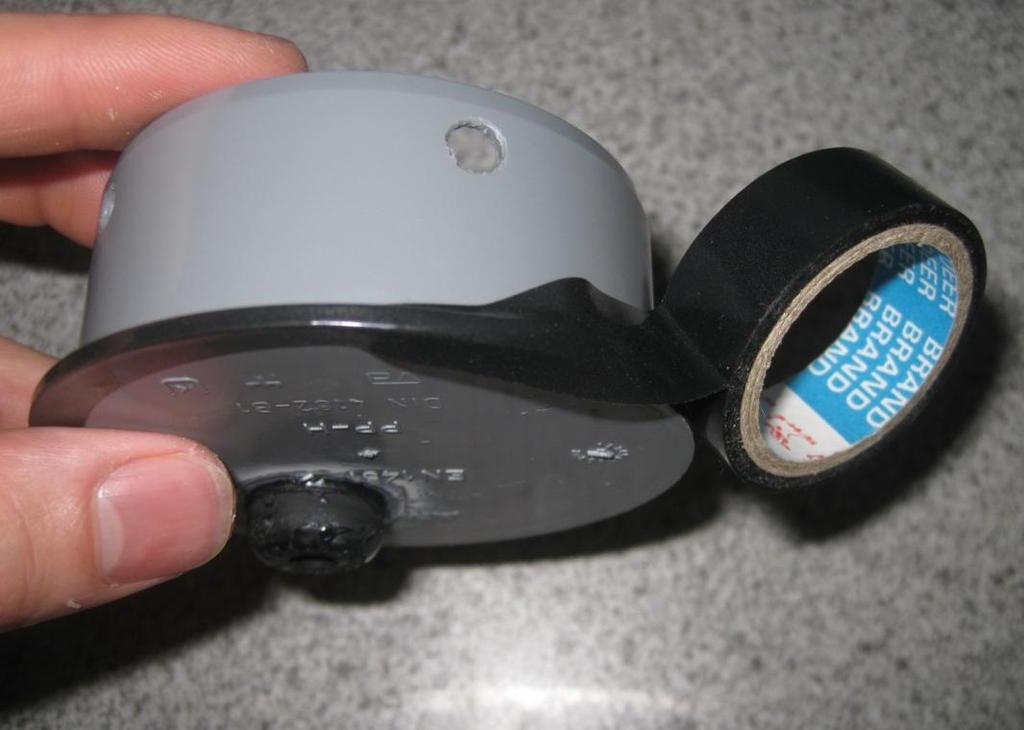 Figure 13 - Applying electrical tape to the plug.