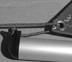Take the S-hook and loop one end through the interlocking eye bolt that is attached to the lower boom (Figure 26). 5.