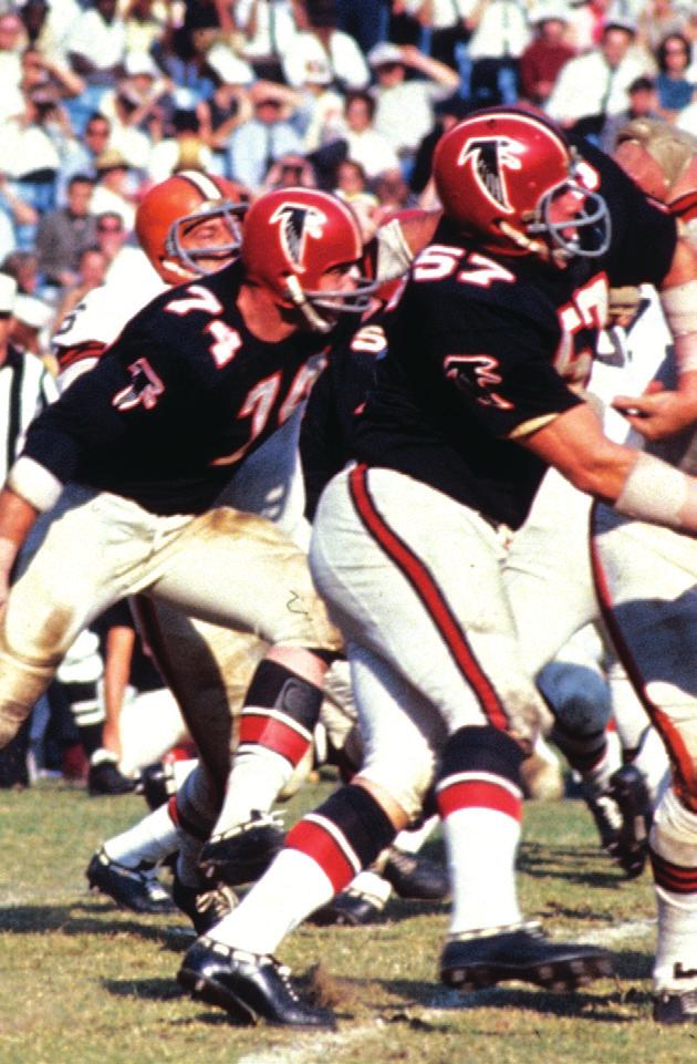 COACHES 1968 70 In 1968, the Falcons removed the Falcon crest logo from the sleeves and replaced it with red and white stripes. Also, a red-black-red stripe combination was added to the sleeves.