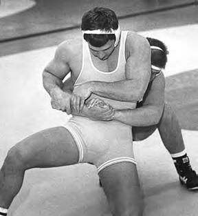 WR-104 Official NCAA Wrestling Rules No. 94 INTERLOCKING OF HANDS AROUND LEGS.