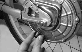 B B B A A FIG. 17 FIG. 18 2. Shift the rear derailleur to high gear (the smallest rear sprocket). 3. Remove the cap (A, Figure 17) from each end of the axle bolt. 4.