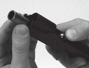 8.3 Pistol Assembly 1. With the slide upside down and the barrel link forward, push the barrel into the slide. 2.
