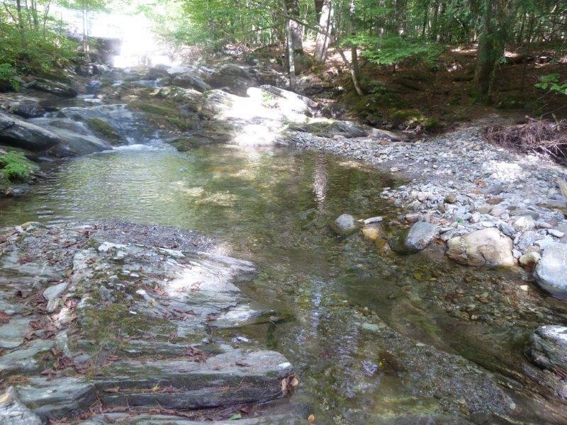 Giddings Brook. It generally follows Monument Hill Road (MHR). It flows under Monument Hill Road three times (1. north of Biddie Knob Road, 2. west of the Parsons School, and 3.