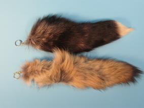 Please call us if you want a particular color. Made in China 18-11-S-L Synthetic Raccoon Tail:Large $3.00 $2.50 42-23-AS 42-23-AS Imitation Fox Tail Keychains:Assorted $5.