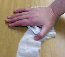 Creeping thumbs Use a bandage about 75cm long. Child to be seated at a table. Place the unrolled bandage in front of them, stretching it out horizontally.