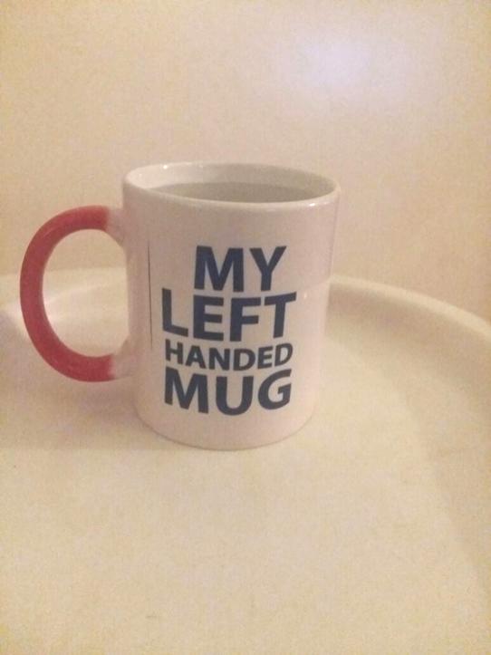 graphics face the mug holder and designed to be seen when held in the left hand only Heat