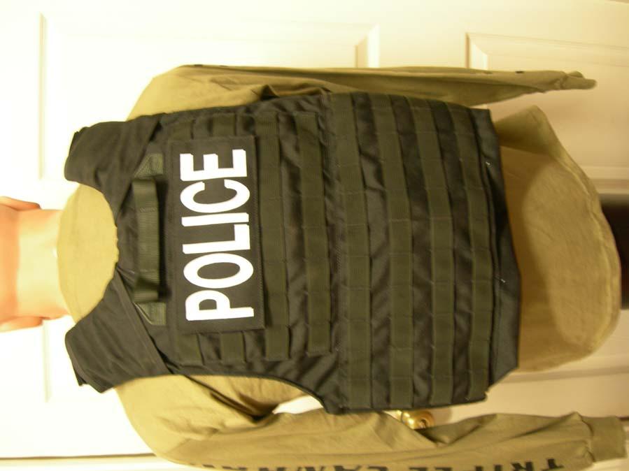 This body armor type vest can be worn with or without the Kevlar inserts and can be outfitted with modular pockets
