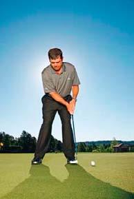 To do this, take an open stance, your weight slightly favoring your left side and your putter shaft leaning toward the target (above).