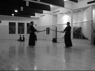 strikes ought to come from overhead along the centerline as with any other men cut in kendo. is is from a misconception as to why/how the locked swords occur.