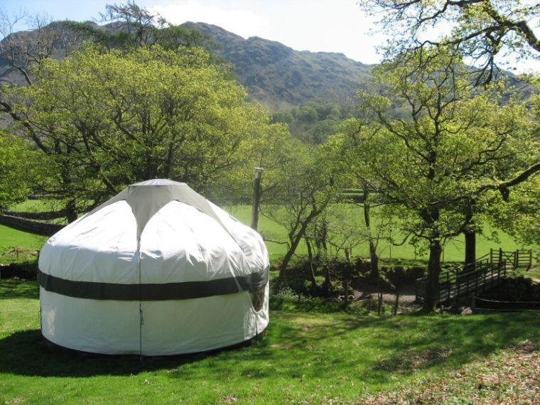 Yurt Evenings Food Equipment A spacious ash and oak frame dwelling in Borrowdale, with comfortable futon beds, a cosy wood burning stove, raised wooden floor, thick woollen rugs, a fully equipped