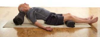 24. Move away from the wall. Position your feet close to pelvis.