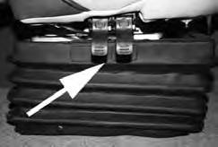 The driver s seat may be adjusted forward or backward by moving the lever below the side of the seat.
