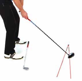 This encourages the correct, upward blow and a more neutral swing path, helping to reduce the causes of the slice.
