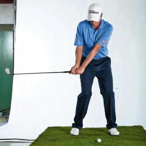 As your big muscles rotate to the left through the shot, your left-hand knuckles should be facing the ground (above).