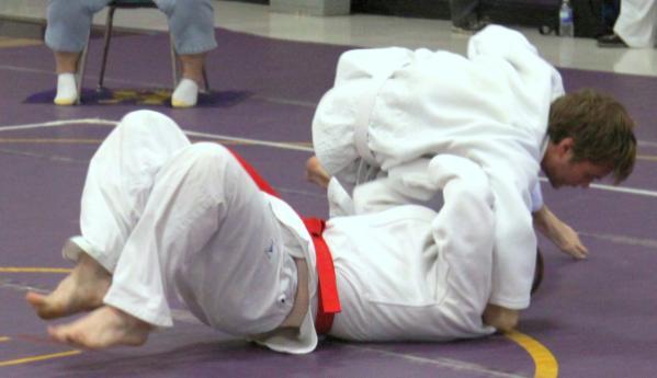 3-The defender is thrown flat onto his back with control and force, meeting the criteria of Ippon.