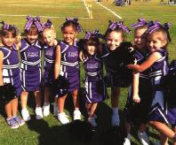 Youth Dance & Cheer Mini Cheer Program covers basic cheer skills, including jumps, tumbling, cheer routines and mini division stunts.