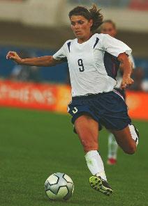A high point in Mia Hamm s career came in 1996. Team USA beat China to win the first ever Olympic women s soccer title. The team won its gold medal on its home turf in Atlanta, Georgia.