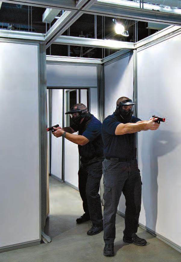 The system uses specially designed operable wall panels hung from an overhead tracking system. I have been able to set up as many as four different training scenarios in a day.