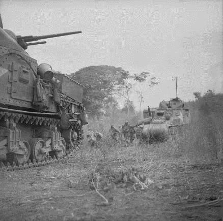 Left: Lees of 254th Indian Tank Brigade support Indian infantry during the advance to Rangoon In 1945. Note the very large stars painted on the hull-sides.
