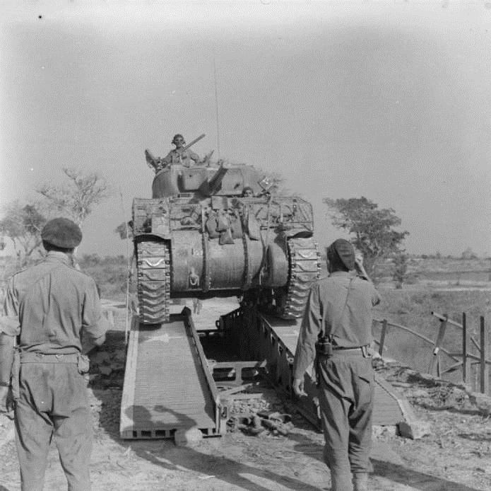 Above: A Sherman of 9th (Royal Deccan) Horse crosses a Valentine AVLB-laid bridge near Meiktila in 1945. Note the mysterious marking showing 20 on white square.