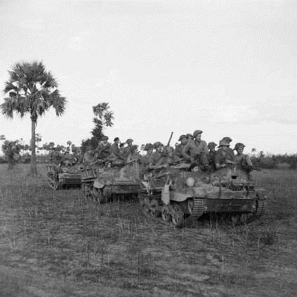 Note the crossed keys formation sign of 2nd Division. Right: Another (overloaded) Carrier patrol of 2nd Recce Regiment pictured in 1945.