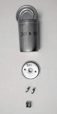 Flat, 1 2-pound, 307 x 200.25 cans use: a. #307 chuck. b. #2 hole in the 3-hole nut. c. two 3 16-inch spacers, one 5 16-inch spacer.
