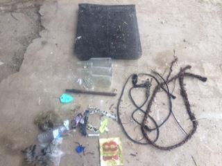 - 3 glass liquor bottles - 3 short pieces of different rope - Various plastic bags, wrapping - CADFW tag - HIOC row