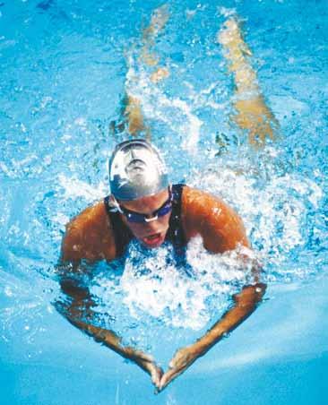 Breaststroke To change the basic breaststroke from an easy, restful, distanceswimming stroke to a high-energy racing stroke, you leave out the long glide and shorten the recovery phase.