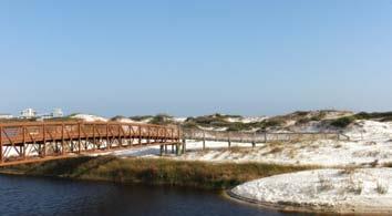 WATERSOUND BEACH ACTIVITIES BRIDGES & FOOTPATHS The trails and pedestrian bridges linking the various neighborhoods of WaterSound Beach were built to protect the dunes,