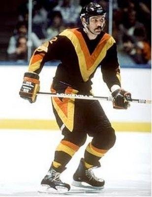 Hockey- Vancouver Canucks Throwback Jerseys: (Honorable Mentions: Santa Claus and Sheriff jerseys): Without a doubt, the NHL has the most elongated list of ugly jerseys in all of sports.