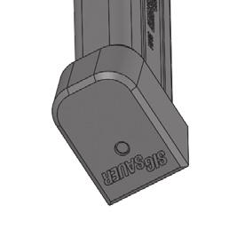 thumb to control the release of magazine spring tension.