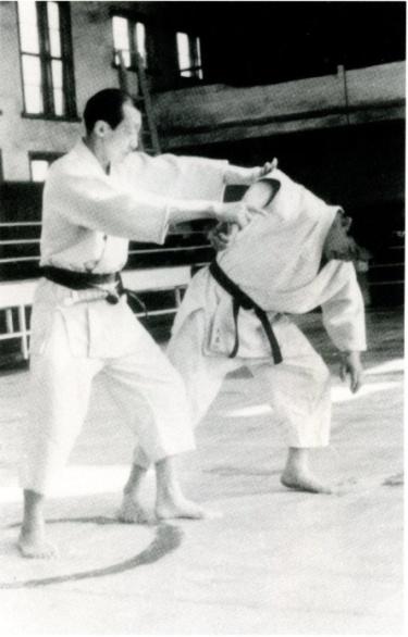 Oshitaoshi - Push Down Balance breaking is achieved by moving Uke's elbow to outside his