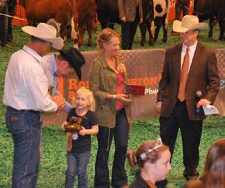 2016 ABBA CARCASS CONTEST Mollie Cutrer receives a trophy from ABBA president George Kempfer for V8 Ranch s High Grading Steer and High Grading Sire Group of the 2016 ABBA Carcass