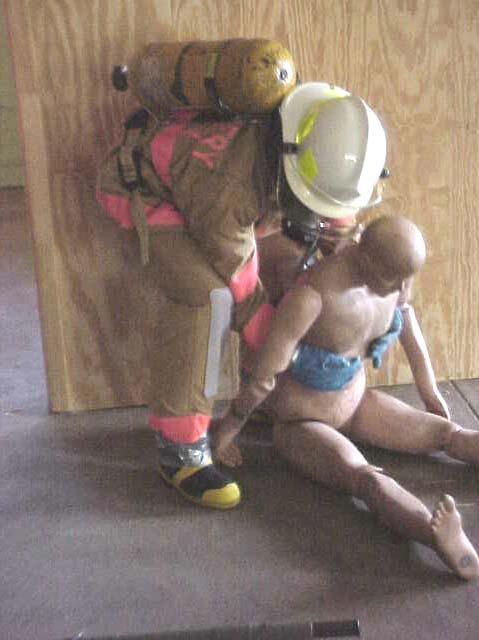 Figure 19. Under-Arm Drag Rescue Operation of 160 Pound Mannequin 4.2 Phase 2, Rescue Mission Analysis Methods.