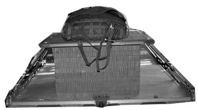 STOWING CARGO PARACHUTES 3-8. When referring to cargo parachutes, stowing consists of three steps. First, place the cargo parachutes on the load or on a parachute stowage platform.