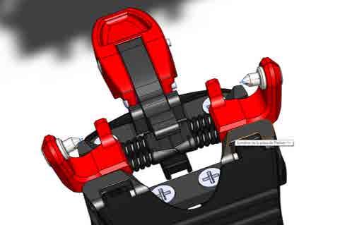 FITTING AND UNFITTING The regulation of the return of the heel is made with the 2 red toothed wheels ; the