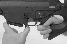 Reloading the SL8-5 Starting situation: The magazine has been emptied the bolt is held by the catch put the rifle on "SAFE" push magazine catch forwards and remove empty magazine Fig.