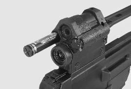Carrying handle with optical sight and reflex sight The 3 power Optical sight is integrated into the carrying handle. A red dot reflex sight is assembled above the optical sight.