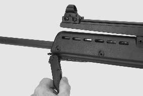 After the locking levers on both bipod legs have been depressed, the bipod can be