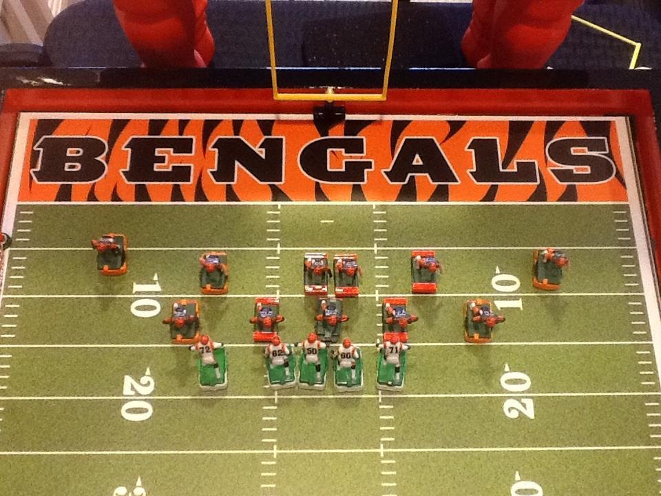6.1.c. Offensive Tackles (OT) Lineman Figure: lined-up on the outside of the Guards and cannot be line-up no farther than the mid-point between the brackets and the numbers on the field.